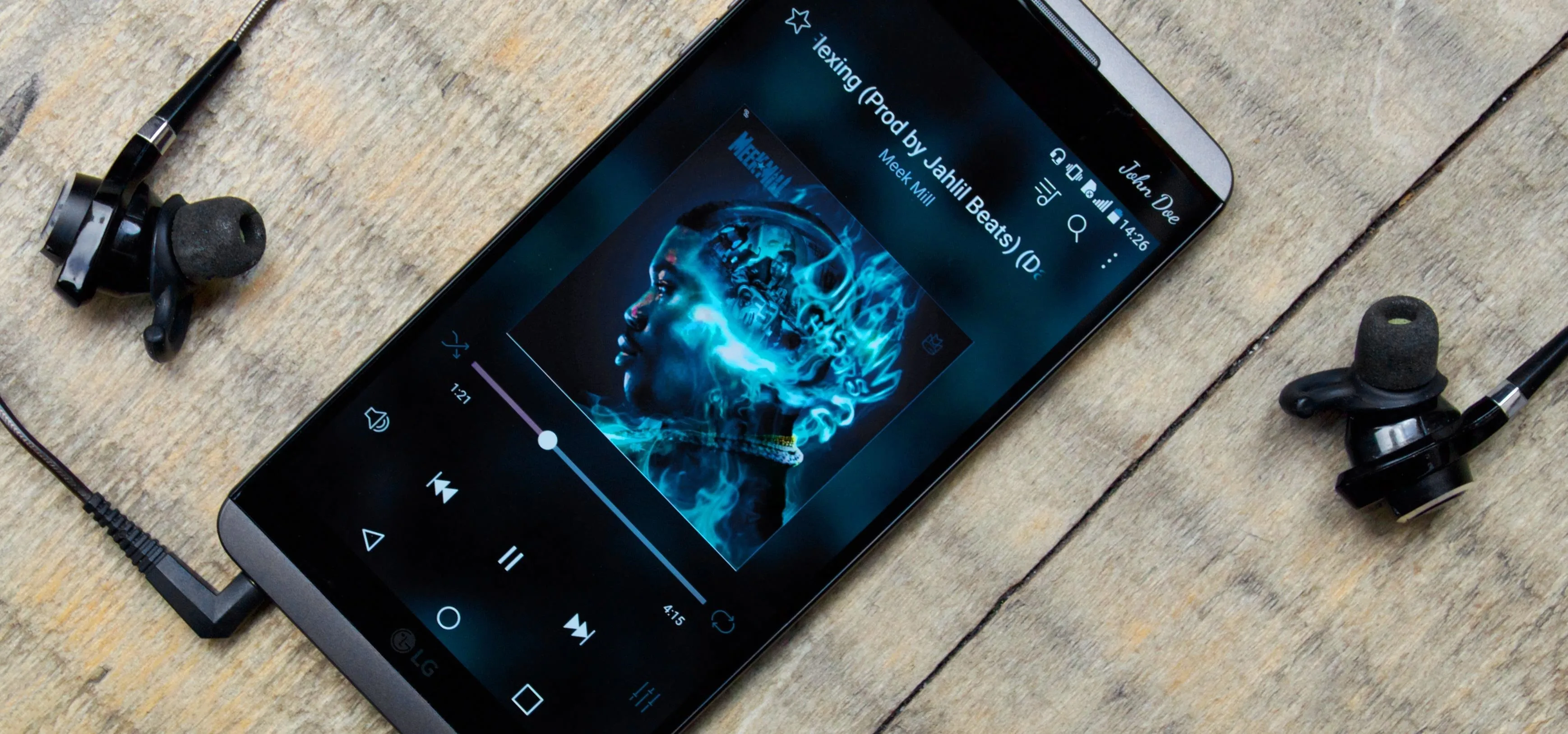 Smartphone displaying a digital music player interface with headphones.
