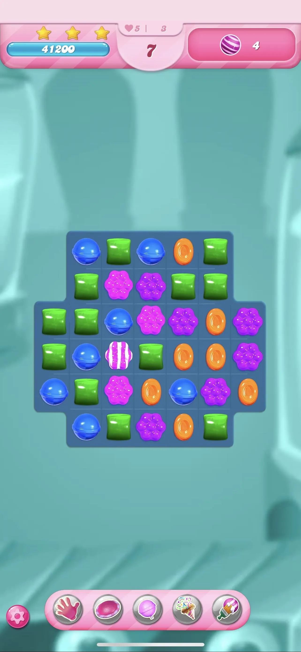 Colorful matching puzzle game board with various shapes and colors.